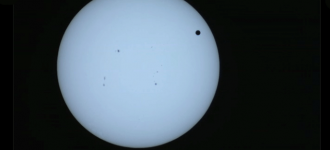 Venus passes the sun - live video